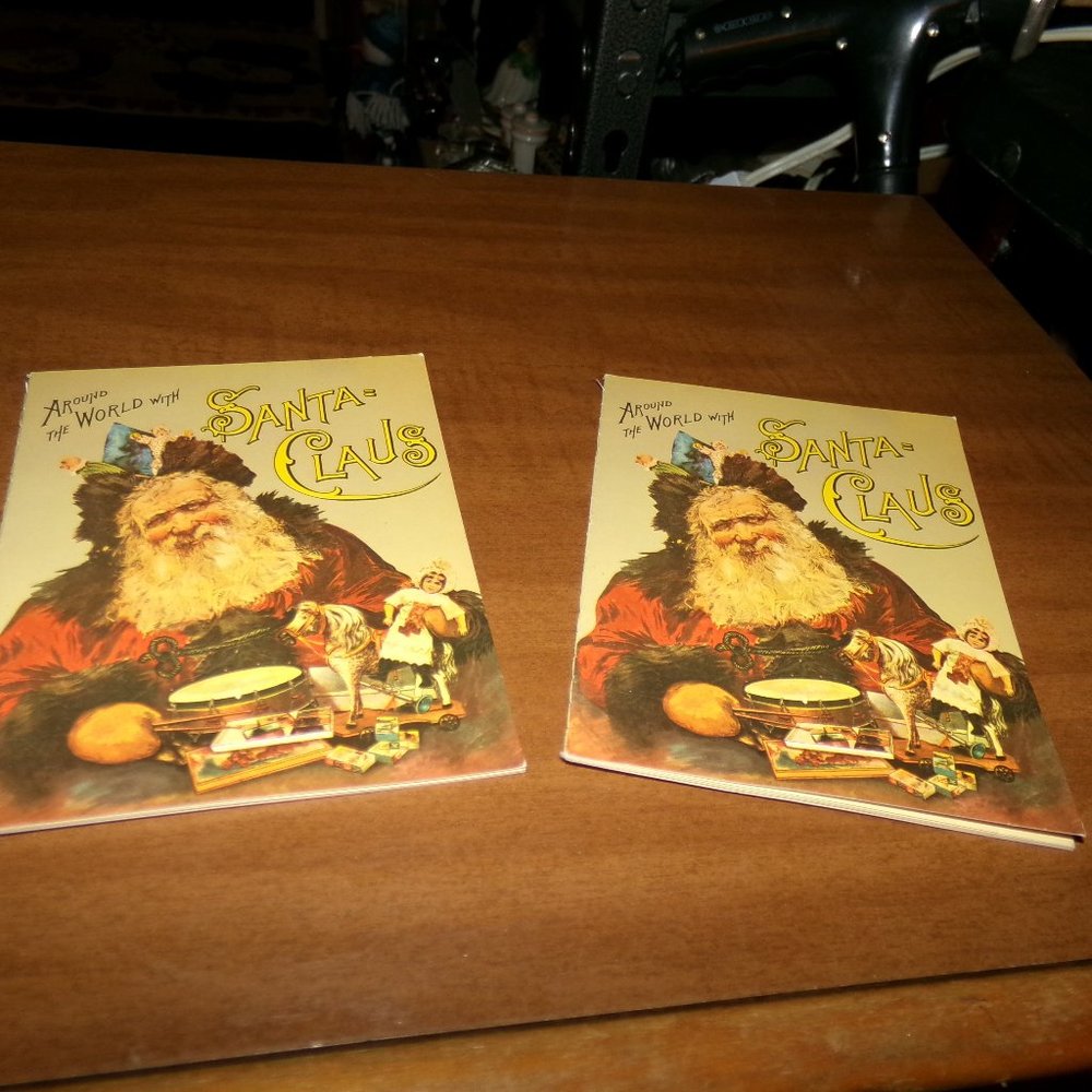 2 small story books around the world with Santa  Claus.